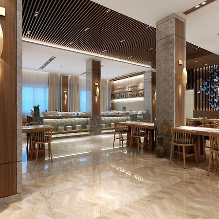 Sanya New City Hotel Bagian luar foto